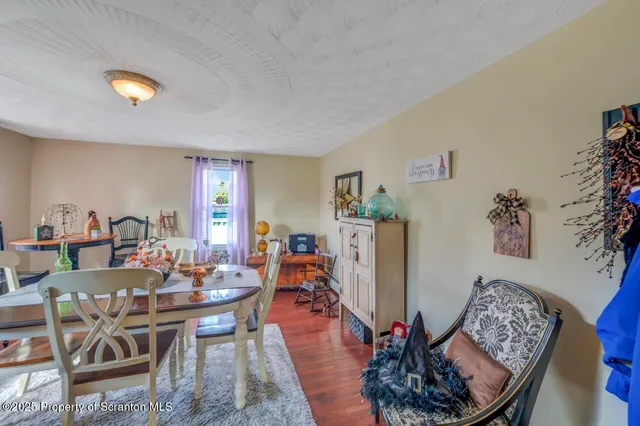 a bathroom with a double vanity sink mirror and toilet
