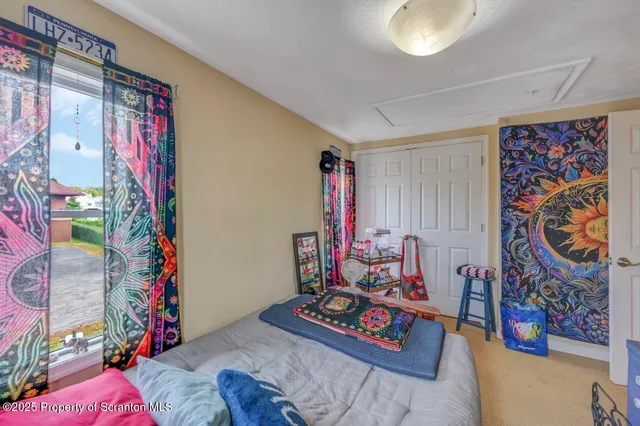 a living room filled with furniture and a table