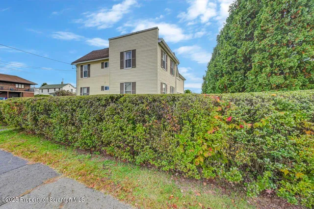 a house view with a outdoor space