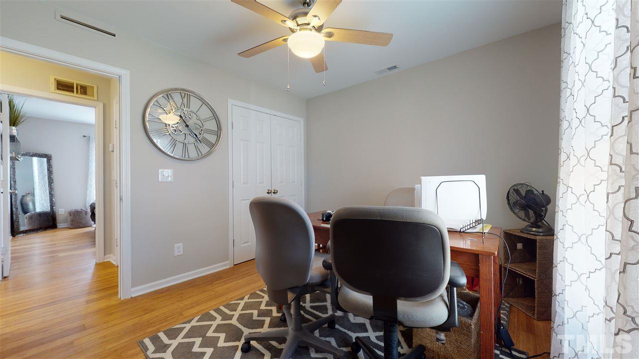 1228 South State Street, Unit A Raleigh, NC 27610 - Photo 11 of 17 a workspace with wooden floor