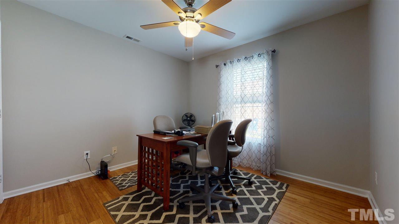 1228 South State Street, Unit A Raleigh, NC 27610 - Photo 10 of 17 a workspace with furniture and window