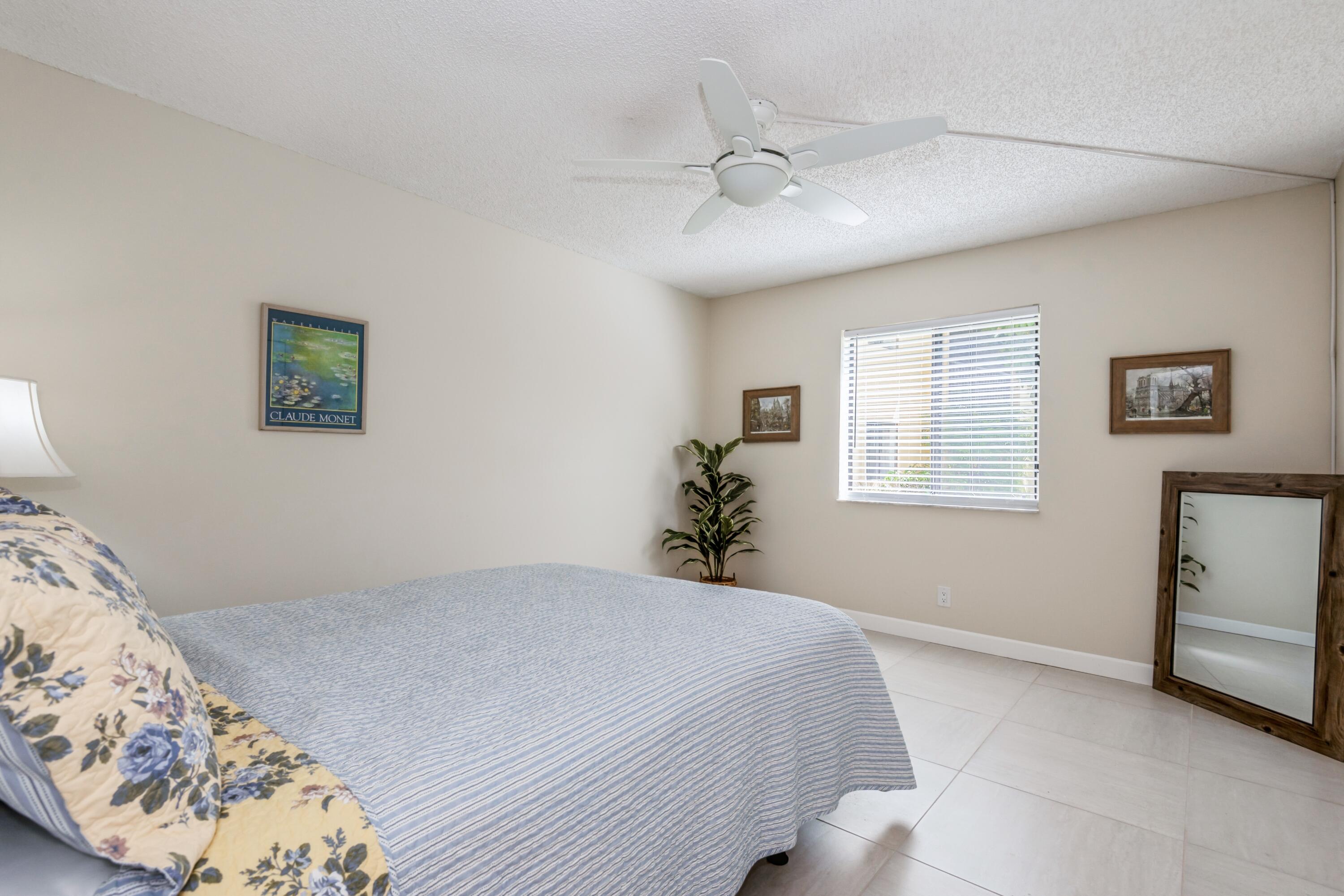 918 Southwest 9th St Circle, Unit 101 Boca Raton, FL 33486 - Photo 6 of 27 Primary Bedroom