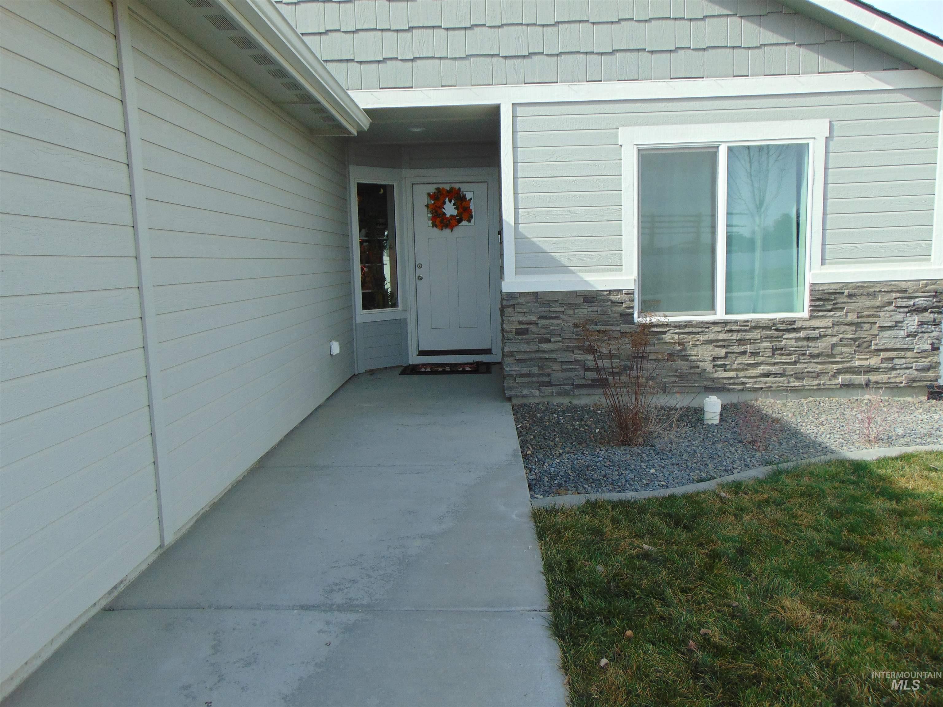 901 Campbell Street Vale, OR 97918 - Photo 3 of 22 View of exterior entry with stone siding