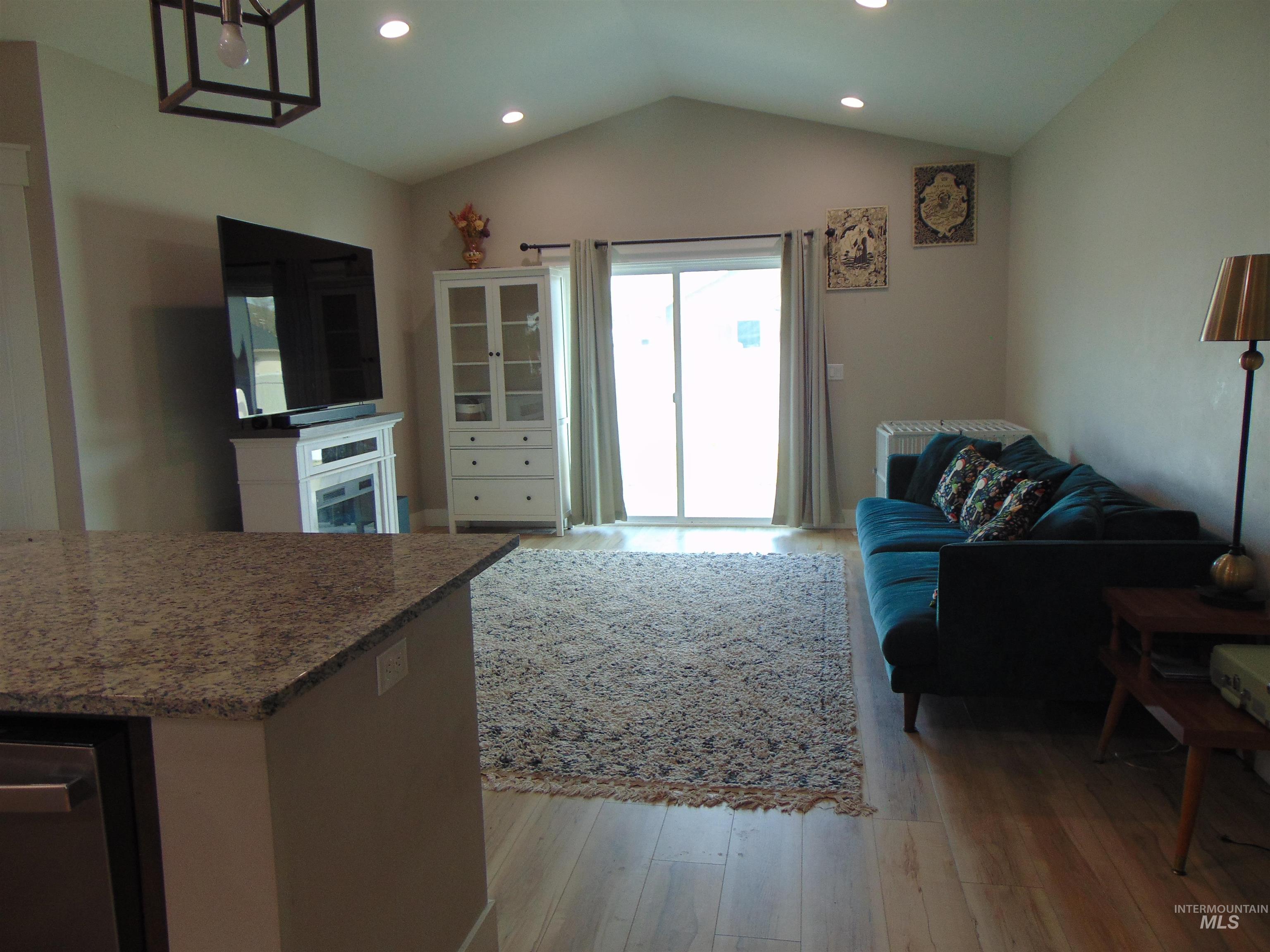 901 Campbell Street Vale, OR 97918 - Photo 5 of 22 Living room with light wood-type flooring and recessed lighting