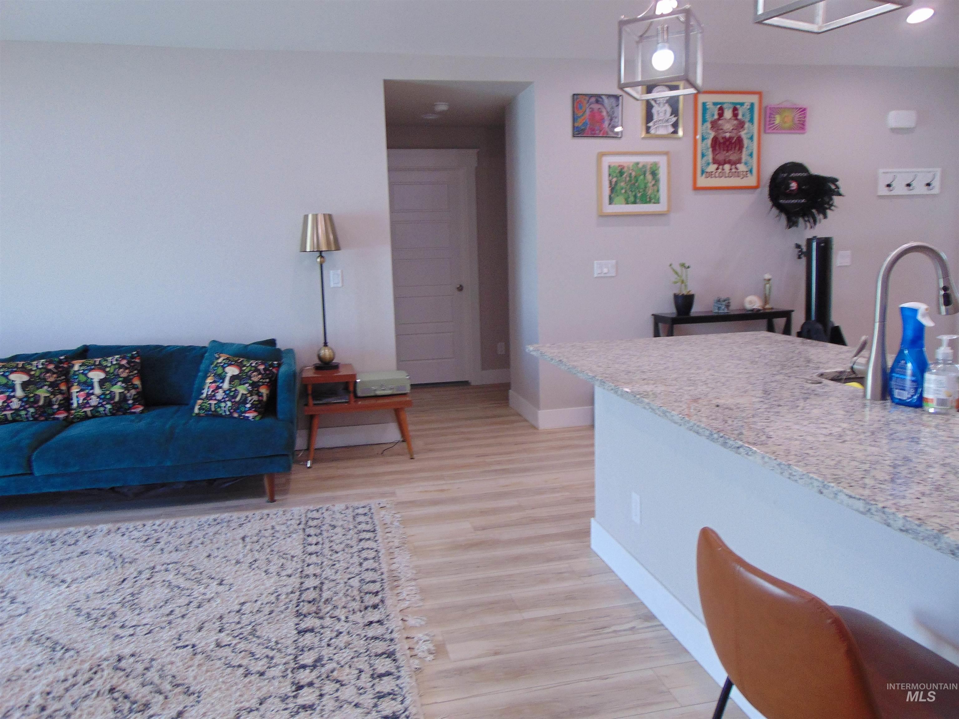 901 Campbell Street Vale, OR 97918 - Photo 9 of 22 Living area with light wood finished floors and baseboards