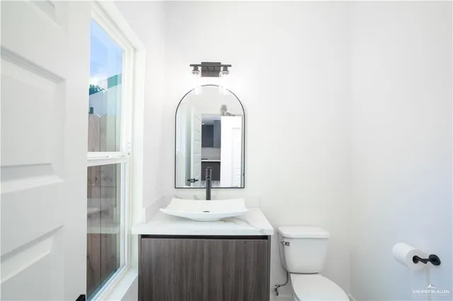 a bathroom with a mirror