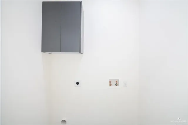 an aerial view of a house with a yard and garage