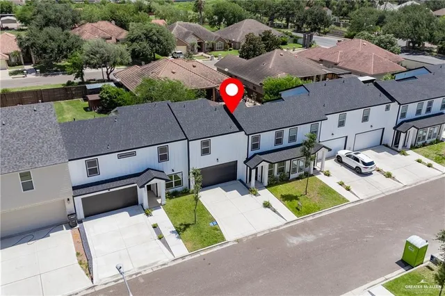 an aerial view of a swimming pool
