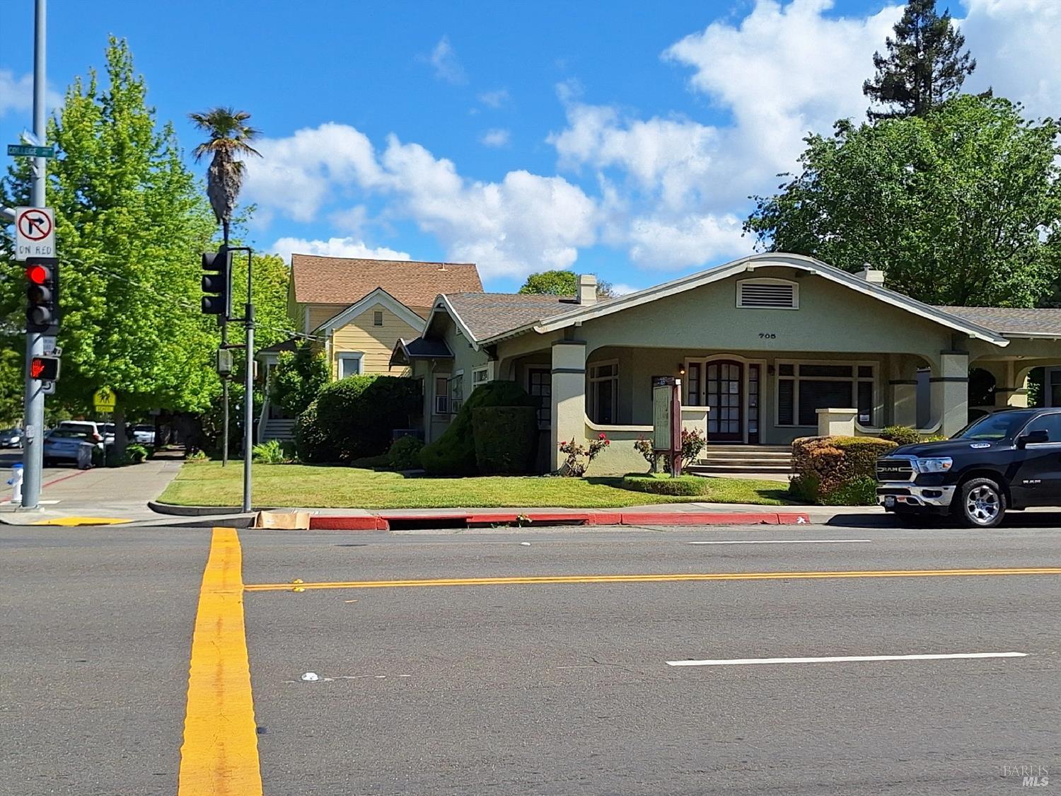 705 College Avenue Santa Rosa, CA 95404 - Photo 16 of 18 a front view of a house with swimming pool and porch