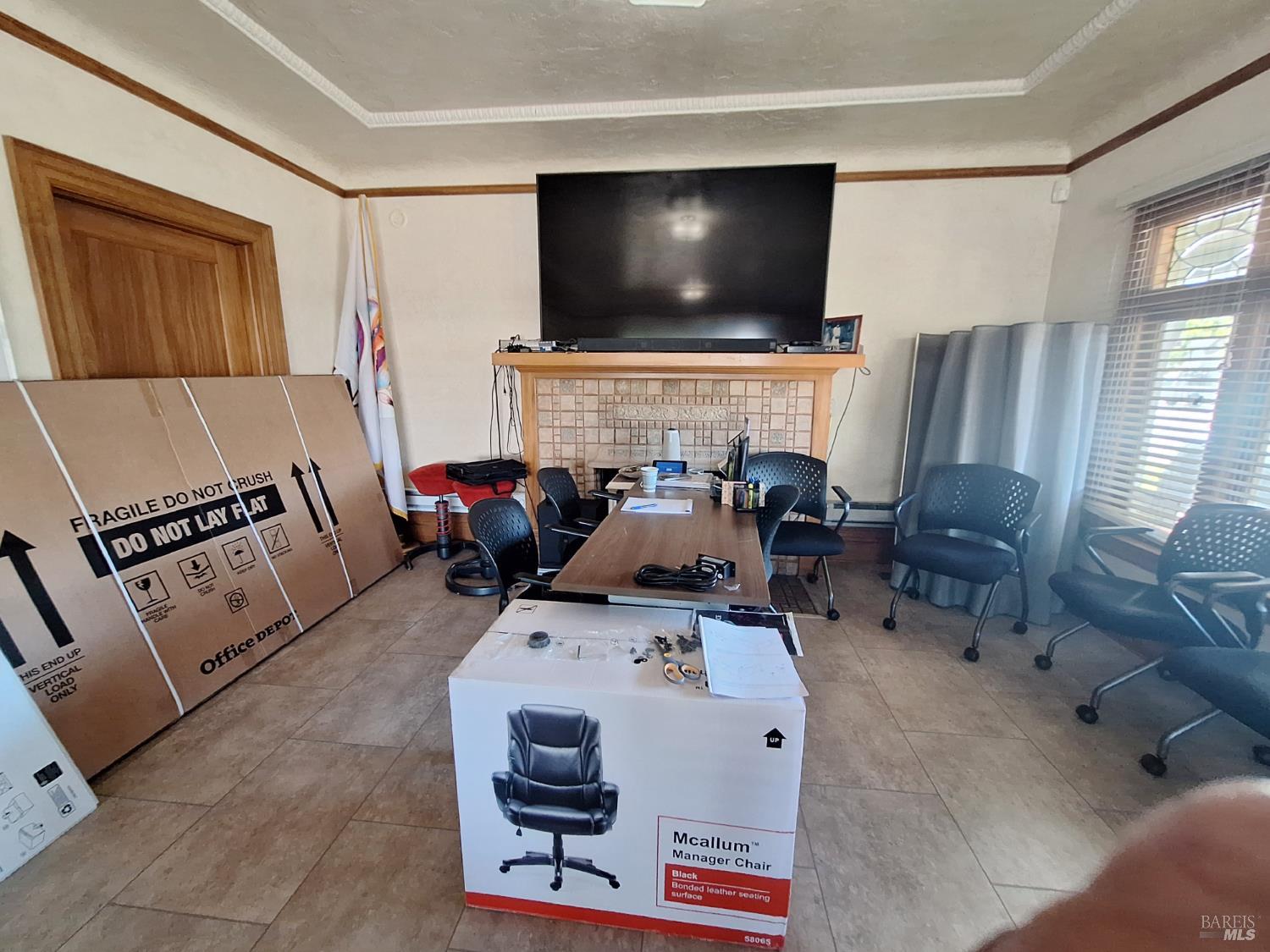 705 College Avenue Santa Rosa, CA 95404 - Photo 8 of 18 a living room with furniture and a flat screen tv