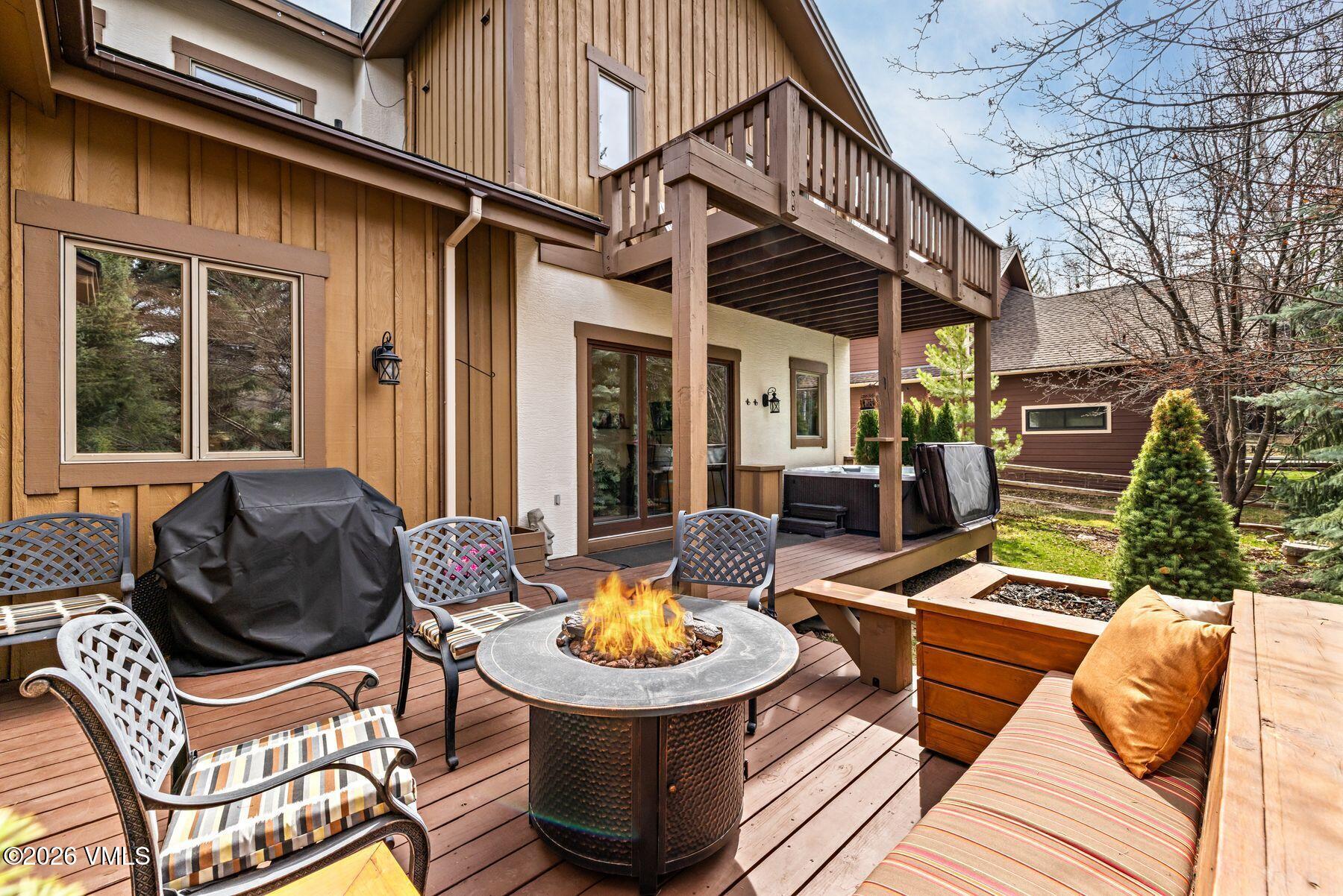 91 Creamery Trail Edwards, CO 81632 - Photo 36 of 44 a view of a patio with couches table and chairs and potted plants