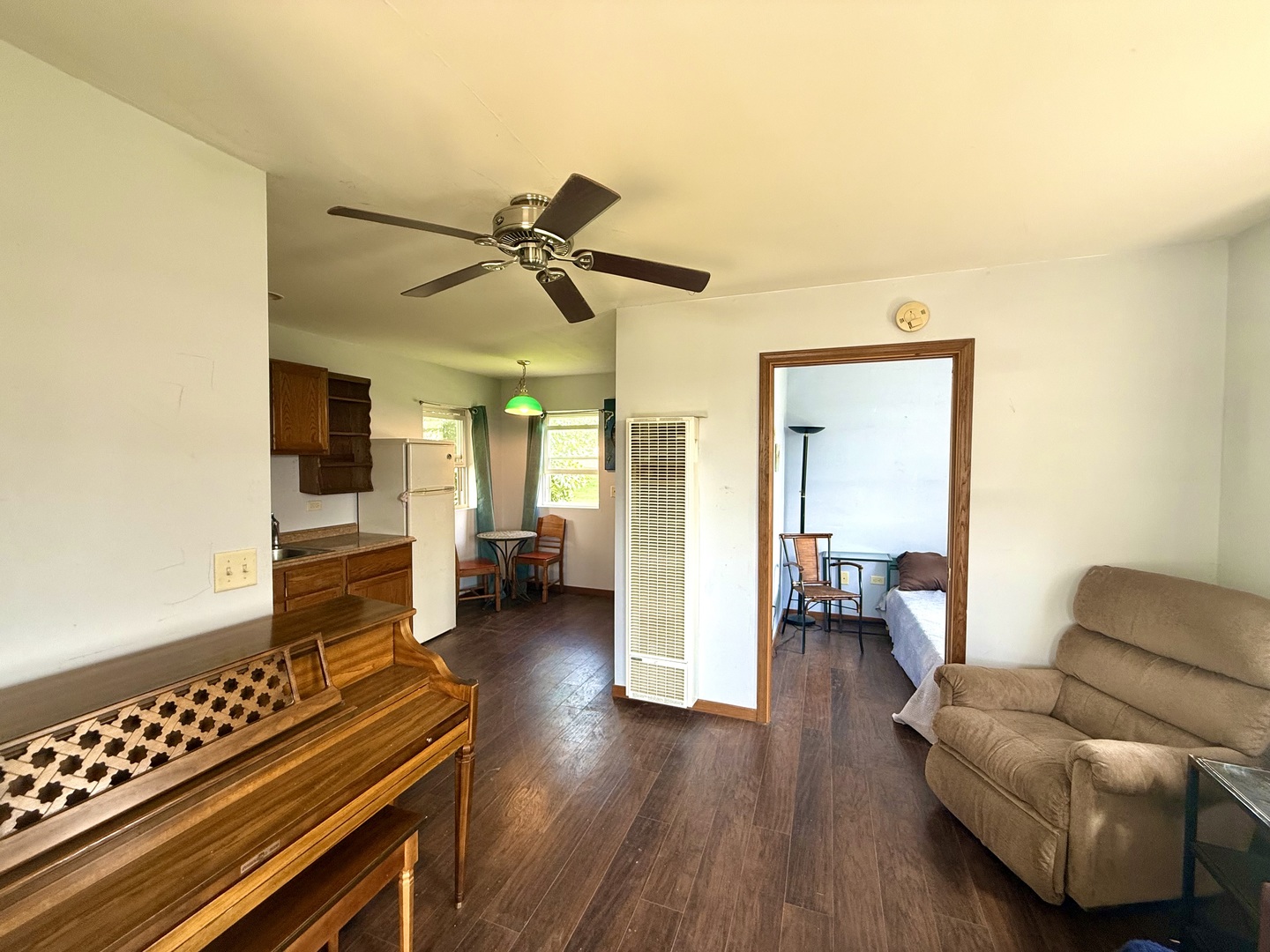 186 Peru Street Paw Paw, IL 61353 - Photo 23 of 27 a living room with furniture and a wooden floor