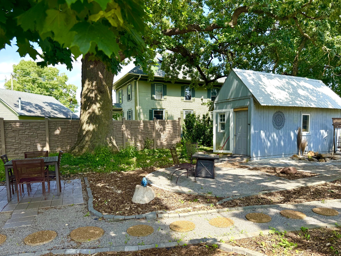 186 Peru Street Paw Paw, IL 61353 - Photo 7 of 27 a front view of a house with garden