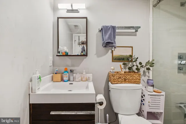 a bed room with a bed and a television