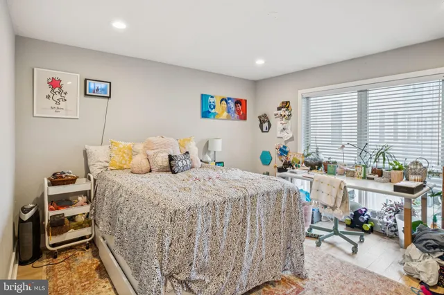 a kitchen with sink a stove and cabinets