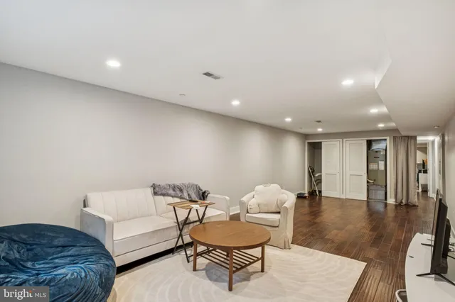 a bathroom with a shower and a sink