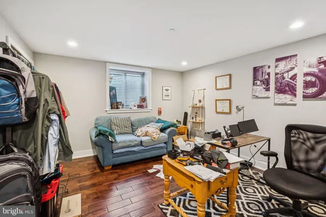 a room with furniture and a wooden floor