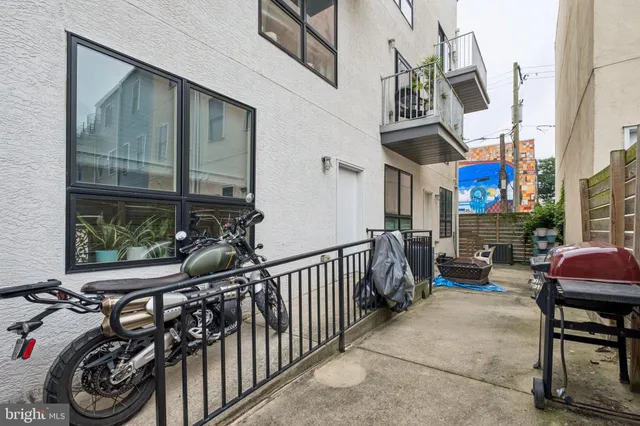 a room with gym equipment and a window