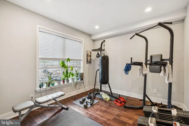 a bathroom with a sink a toilet and shower curtain