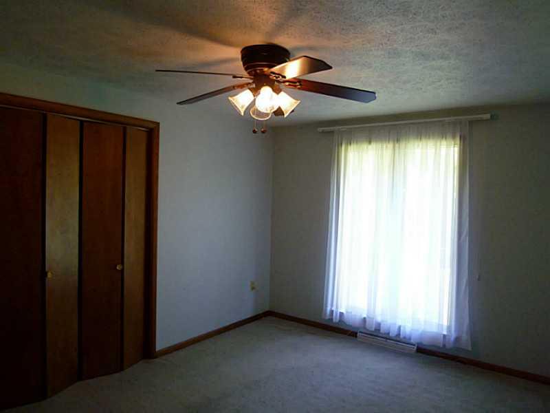 394 Maple Road Burgettstown, PA 15021 - Photo 12 of 25 Bedroom. Our 1st guest BR features neutral walls and carpeting w/ quite a large closet