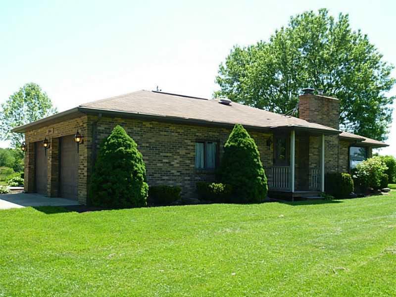 394 Maple Road Burgettstown, PA 15021 - Photo 19 of 25 Exterior Back. The side view of this lovely brick ranch features professional and well maintained landscaping