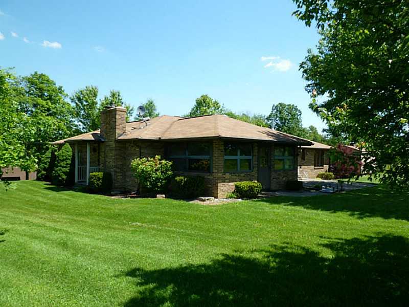 394 Maple Road Burgettstown, PA 15021 - Photo 20 of 25 Exterior Back. A beautiful back yard and patio with an abundance of shade, sun and breathtaking view.