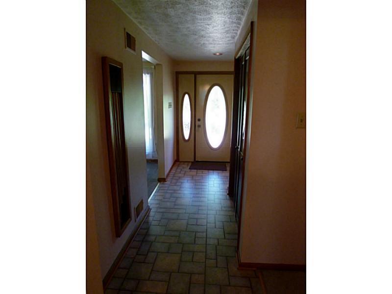 394 Maple Road Burgettstown, PA 15021 - Photo 3 of 25 Entry/Foyer. Our neutral wall tones accent lovely wood door trim and window.