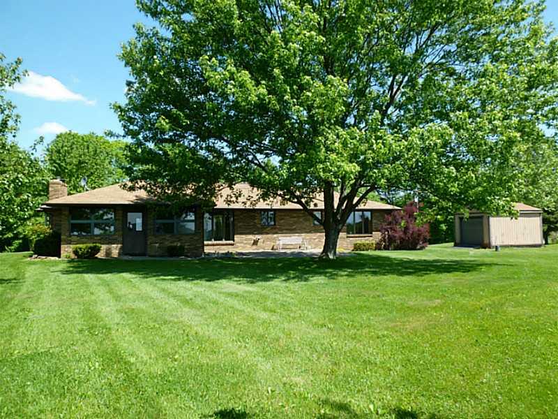 394 Maple Road Burgettstown, PA 15021 - Photo 22 of 25 Exterior Back. Our sun-room flows out into a lovely level back yard and patio.