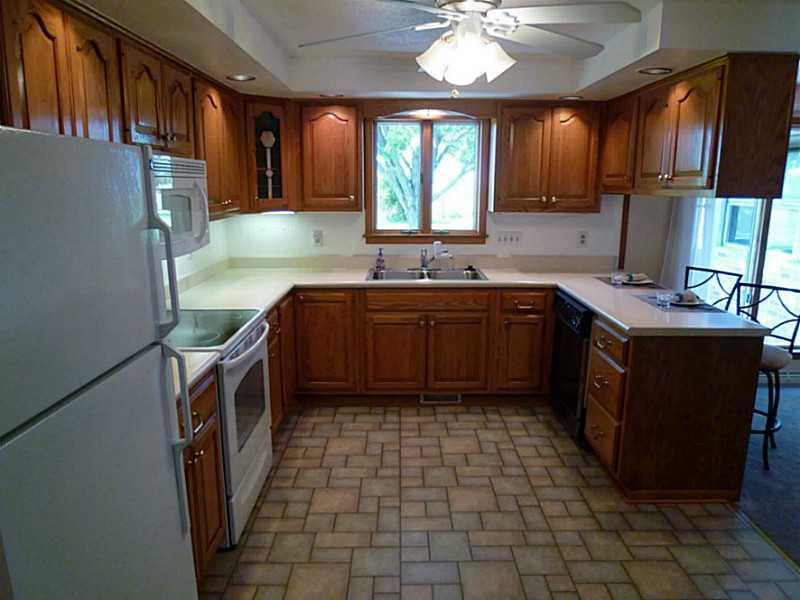 394 Maple Road Burgettstown, PA 15021 - Photo 4 of 25 Kitchen. Beautiful oak cabinets and abundant counter space compliment our kitchen breakfast bar.