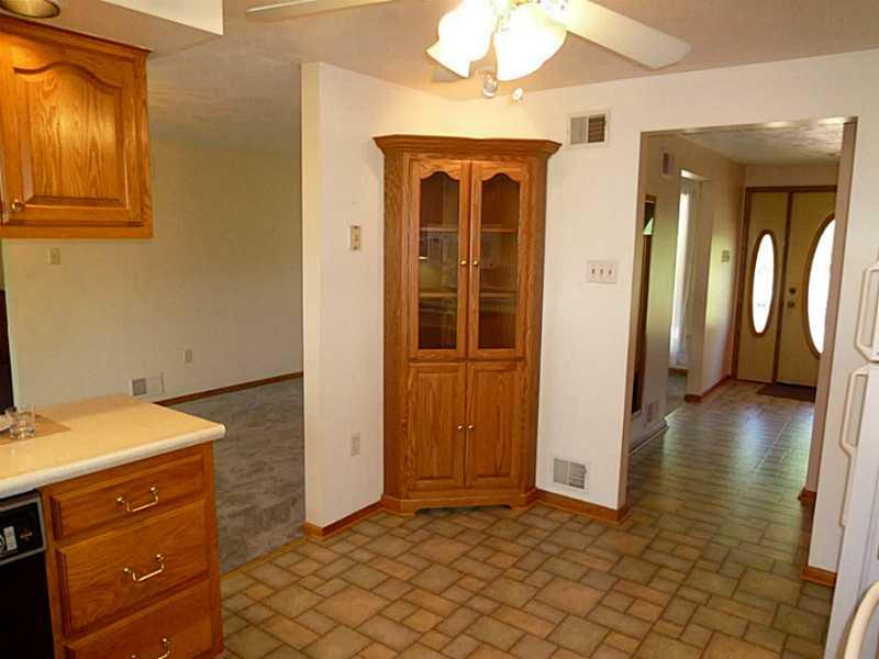 394 Maple Road Burgettstown, PA 15021 - Photo 5 of 25 Kitchen. Lovely built in china cabinet is special addition to our soft neutral painted walls.