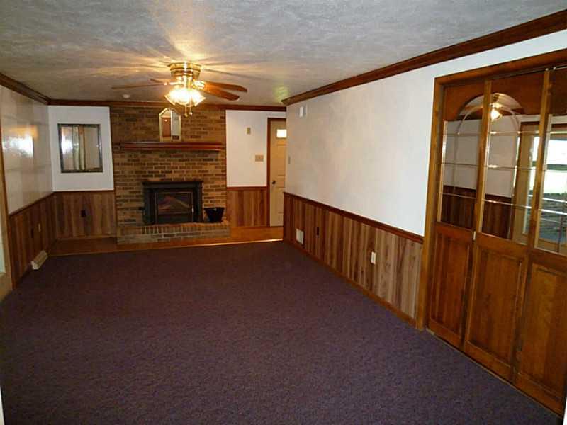 394 Maple Road Burgettstown, PA 15021 - Photo 6 of 25 Family Room. Our family room features a wood burning fireplace and 1st floor laundry access.