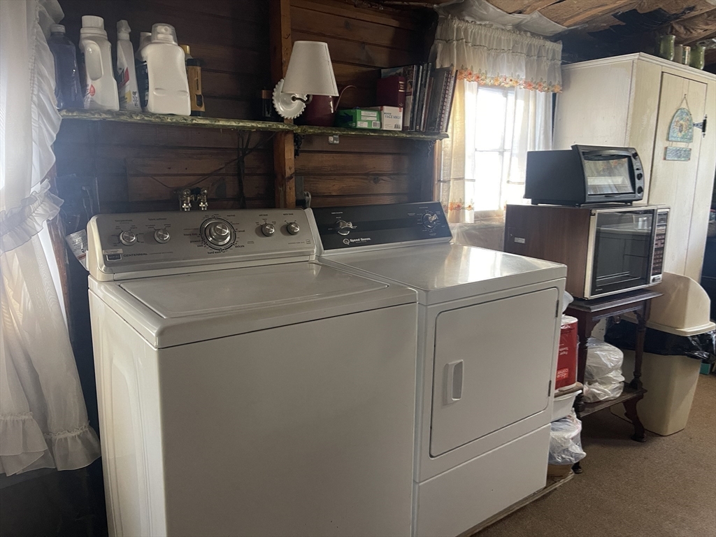 172 Shelters Road Groton, MA 01450 - Photo 17 of 40 a utility room with dryer and washer