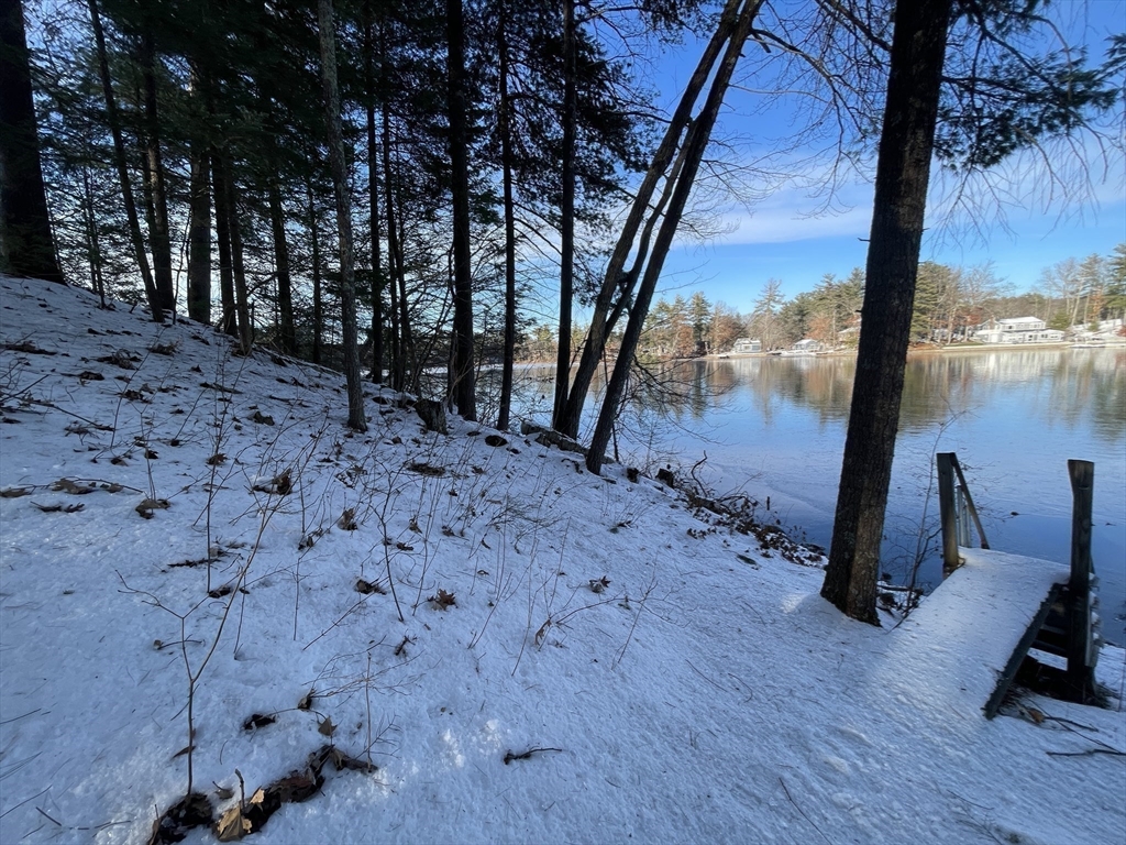 172 Shelters Road Groton, MA 01450 - Photo 28 of 40 a view of a backyard of the house