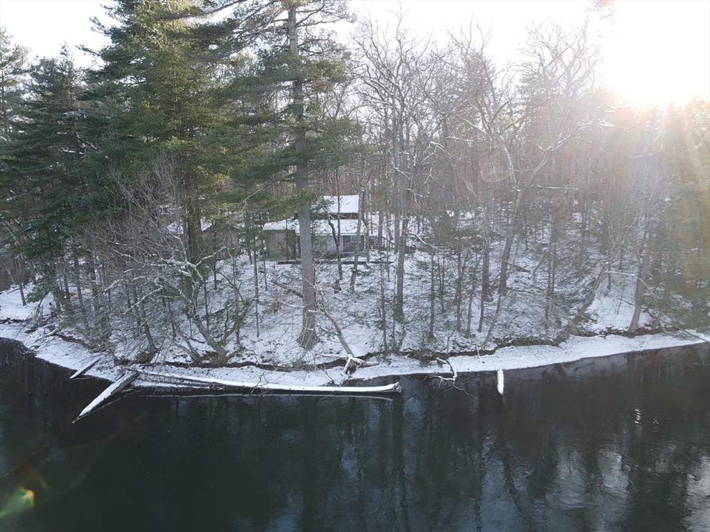 172 Shelters Road Groton, MA 01450 - Photo 30 of 40 a view of swimming pool next to a yard