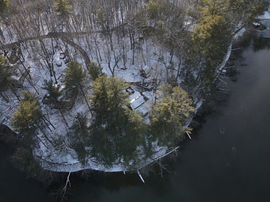 172 Shelters Road Groton, MA 01450 - Photo 32 of 40 a vase of flowers sitting on a table