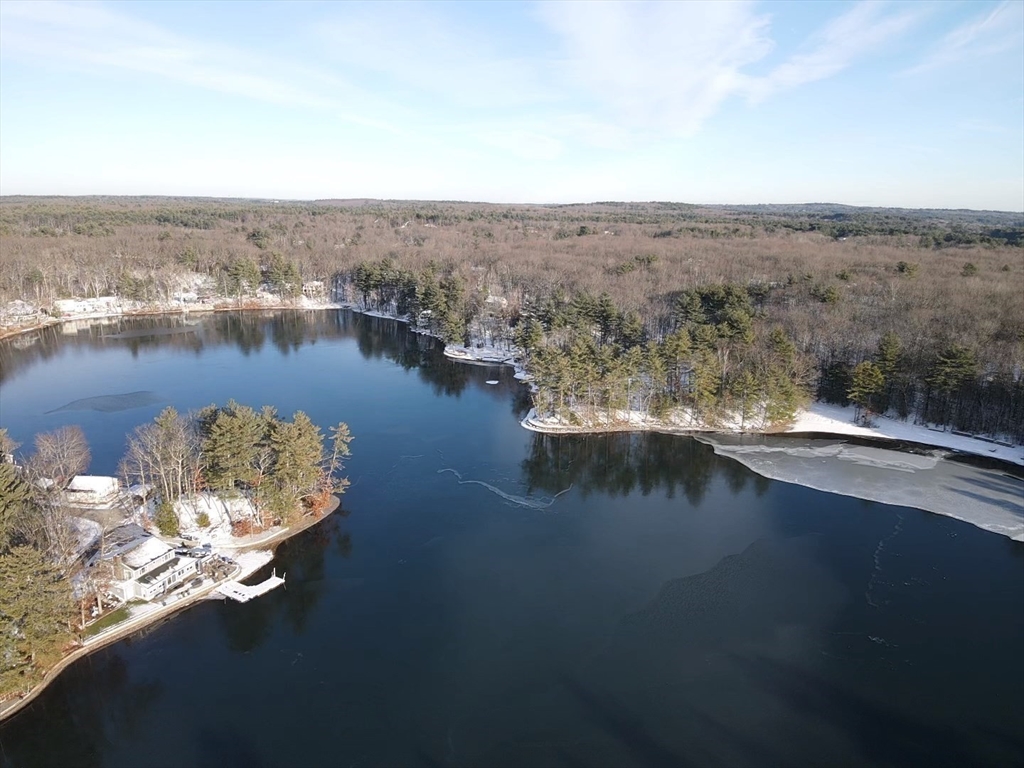 172 Shelters Road Groton, MA 01450 - Photo 37 of 40 an aerial view of a house with a lake view