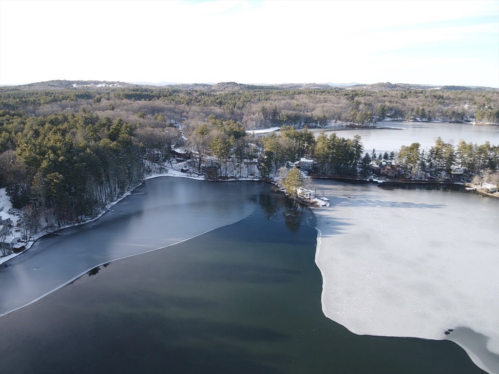 172 Shelters Road Groton, MA 01450 - Photo 38 of 40 a view of a lake in middle of the house