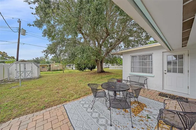a living room with furniture and windows