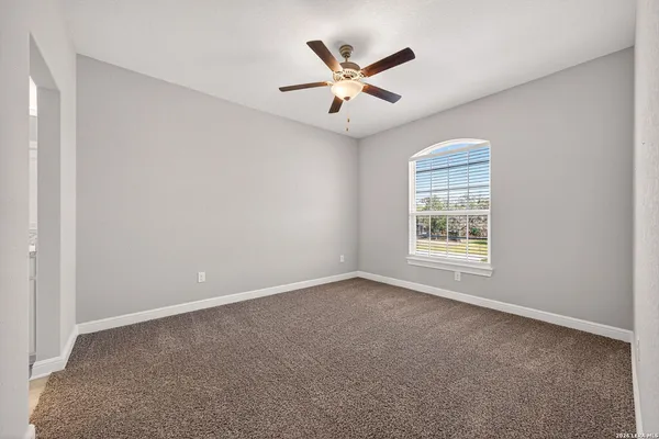 a view of a backyard with a small cabin
