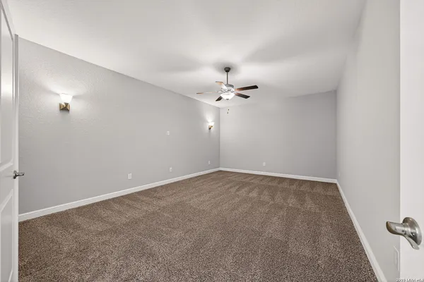 a bathroom with a double vanity sink and mirror
