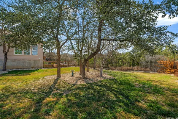 an aerial view of residential house with outdoor space
