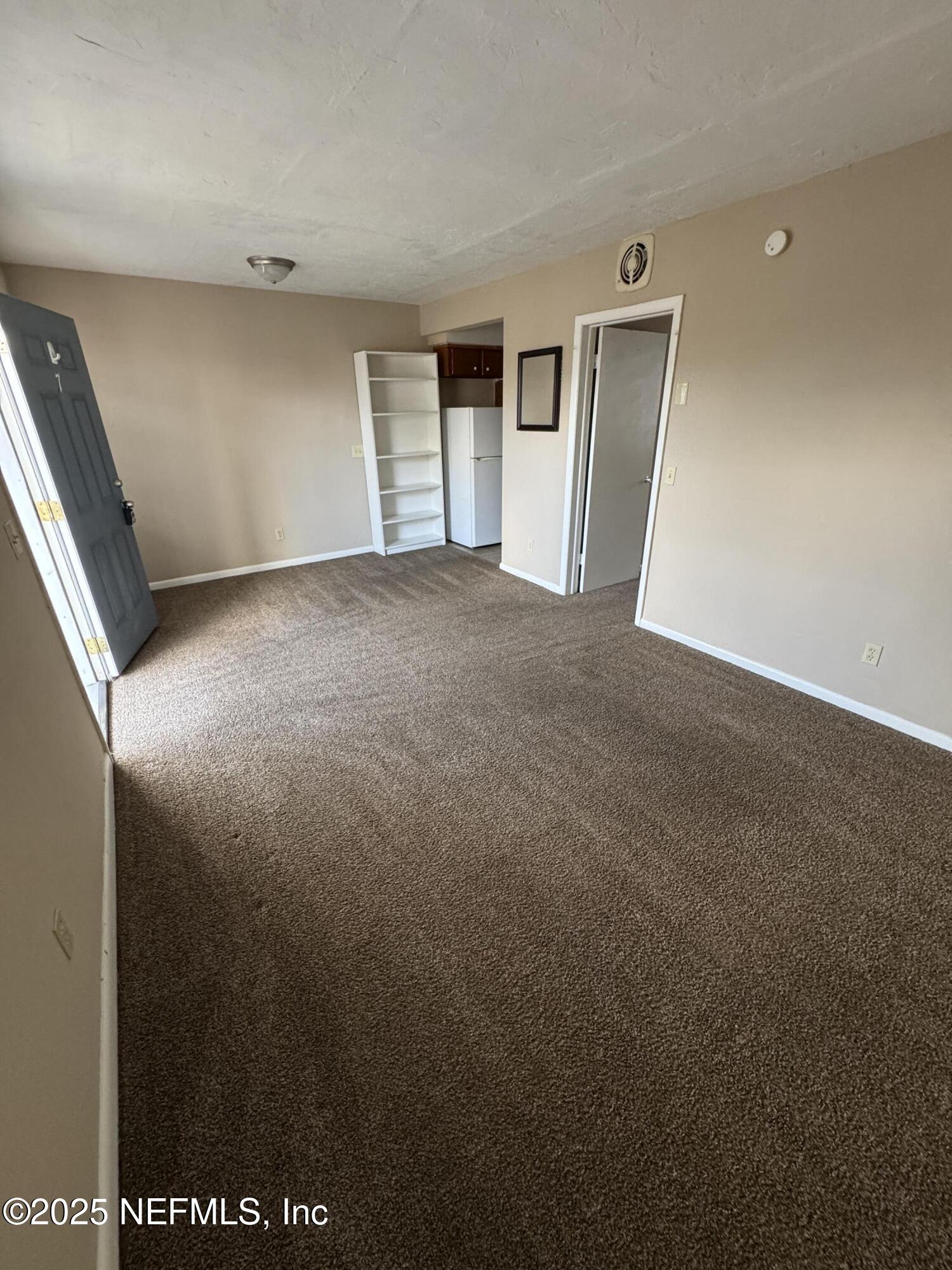 916 Childrens Way, Unit 7 Jacksonville, FL 32207 - Photo 5 of 10 a view of an empty room