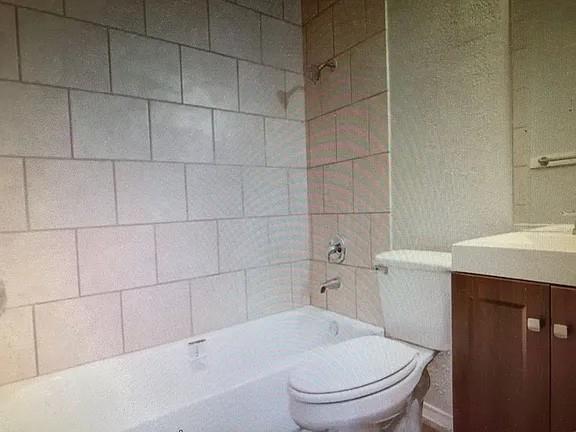 2203 Tabor Court Austin, TX 78748 - Photo 1 of 6 a bathroom with a toilet and a sink
