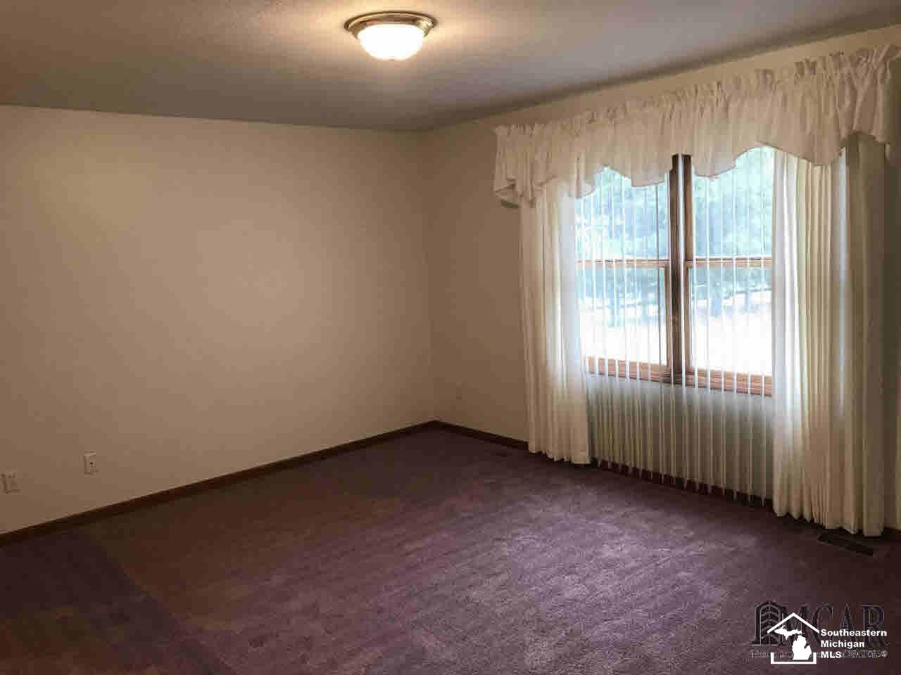 943 Eagle Ridge Trail Temperance, MI 48182 - Photo 7 of 14 Master Bedroom