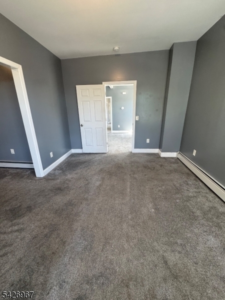 23 Elliott Street Newark, NJ 07104 - Photo 5 of 25 a view of an empty room
