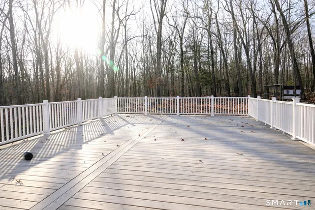 a view of a terrace with trees