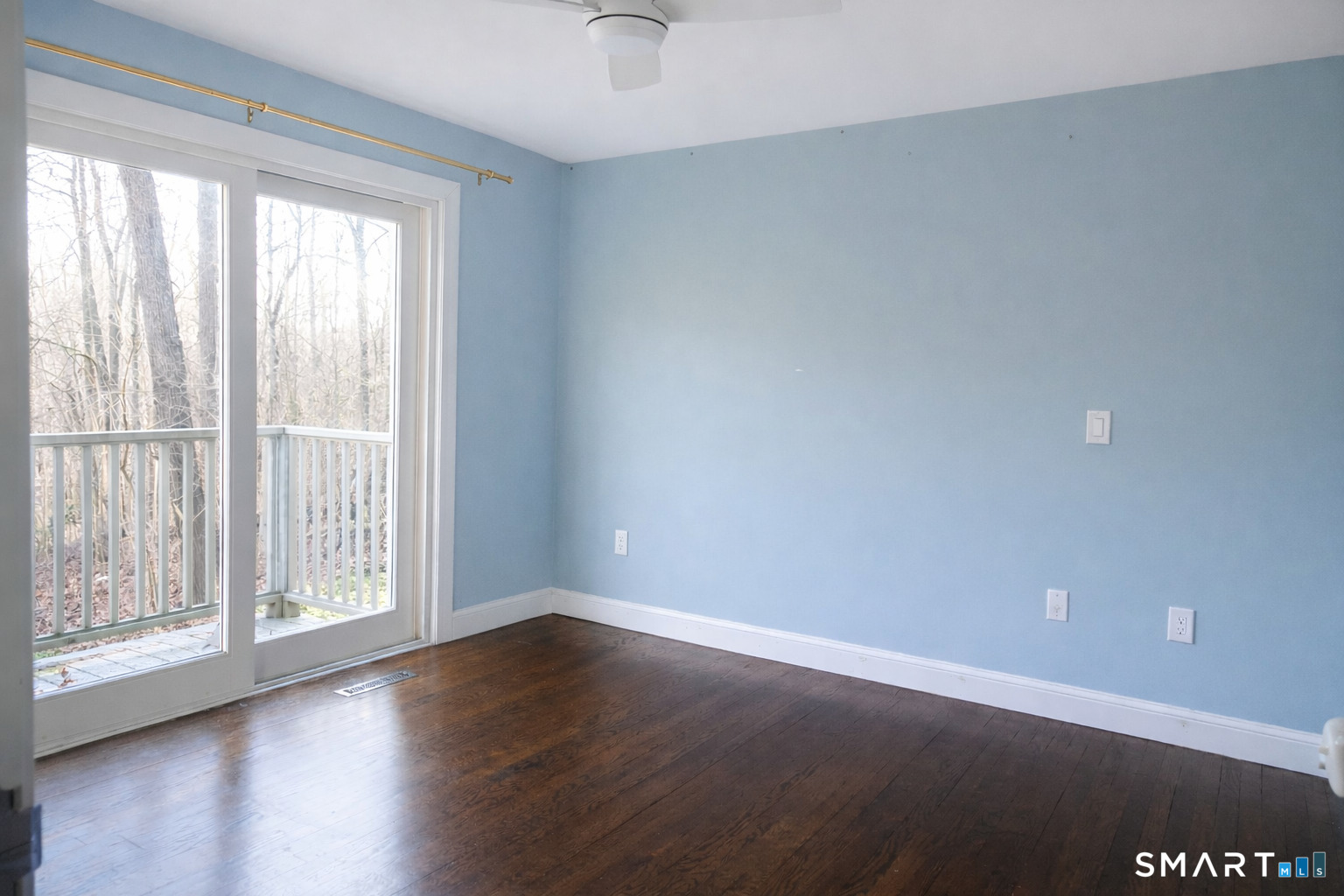 2079 Portland-Cobalt Road Portland, CT 06480 - Photo 8 of 13 a view of an empty room with wooden floor and a window