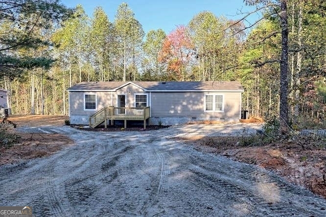 2013 Buckhorn Road Clarkesville, GA 30523 - Photo 1 of 1 a view of a house with backyard and a tree