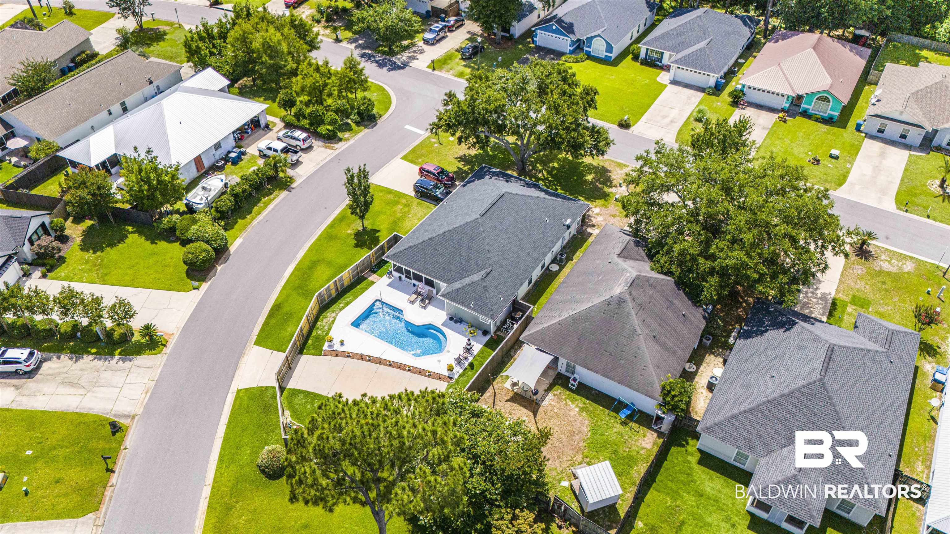 4620 Pine Boulevard Orange Beach, AL 36561 - Photo 44 of 49 Aerial perspective of suburban area featuring a pool