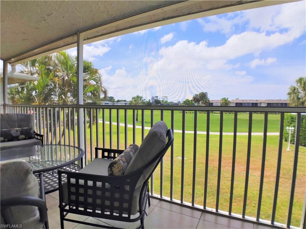 108 Penny Lane, Unit 4 Naples, FL 34112 - Photo 21 of 33 a view of balcony with furniture